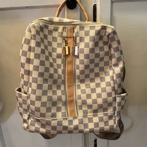 Gently used backpack purse.